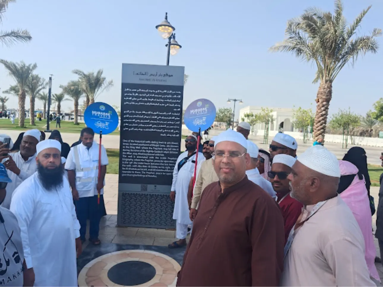 Group of Mubarak Travels pilgrims in ihram